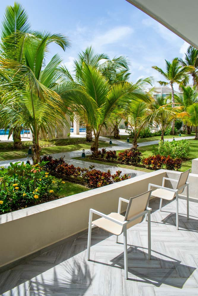 View from the balcony overlooking the greenery at Beach Apartamentos in Playa Palmera 